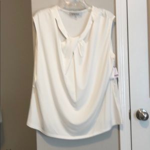 Never worn, business top with tags!